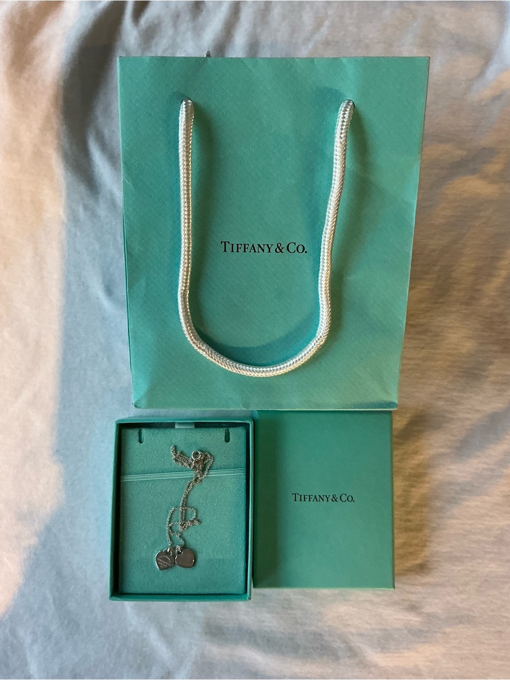 Tiffany & Co. Blue Green Gift Bag with Silver Heart Necklace
